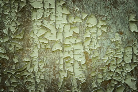 Vintage and grunge green wall with peelled paint.の写真素材