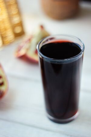 Fresh organic juice made from pomegranate seeds.の写真素材