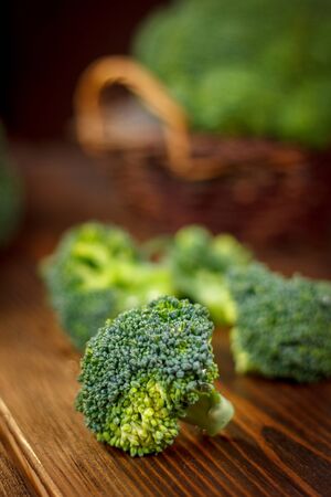 Beautiful broccoli crowns on a wooden board.の写真素材