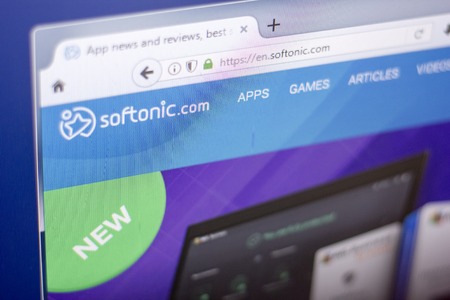 Ryazan, Russia - March 01, 2018 - Homepage of Softonic site on a display of PC.のeditorial素材