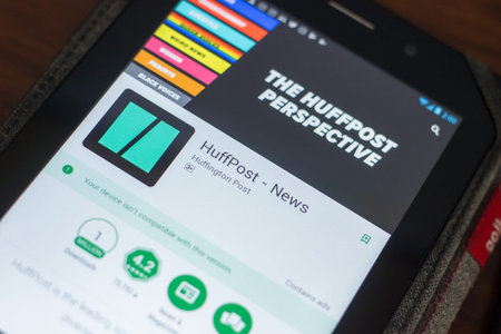 Ryazan, Russia - May 16, 2018: HuffPost news mobile app on the display of tablet PC
