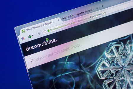 Ryazan, Russia - May 20, 2018: Homepage of Dreamstime website on the display of PC, url -...