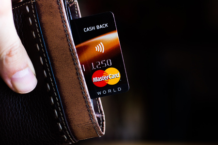 Ryazan, Russia - February 27, 2018: Credit or debit card of Mastercard brand in a leather walletのeditorial素材