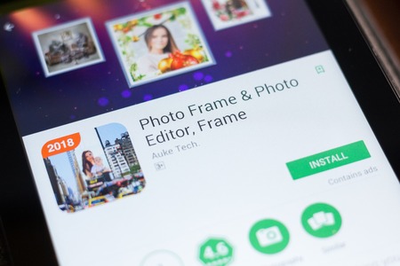 Ryazan, Russia - June 24, 2018: Photo Frame and Photo Editor mobile app on the display of tablet PCのeditorial素材