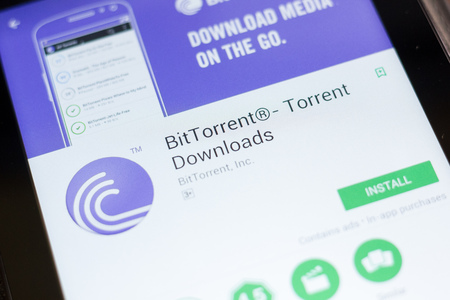 Ryazan, Russia - June 24, 2018: BitTorrent, Bit Torrent downloads mobile app on the display of tablet PCのeditorial素材