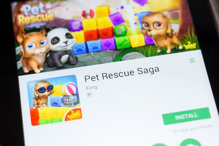 Ryazan, Russia - June 24, 2018: Pet Rescue Saga mobile app on the display of tablet PCのeditorial素材