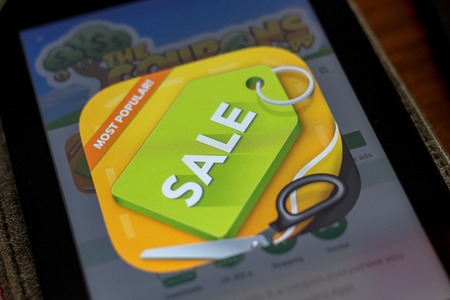 Ryazan, Russia - July 03, 2018: The Coupons mobile app Logo on the display of cell phoneのeditorial素材