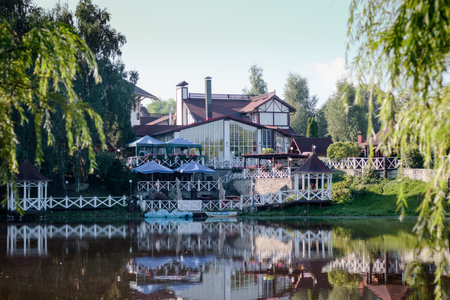 Lake house at the shore of lake, restaraunt at the shoreの写真素材