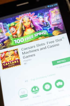 Ryazan, Russia - July 03, 2018: Caesars Slots: Free Slot Machines and Casino Games icon in the list of mobile appsのeditorial素材