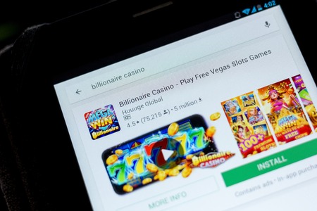 Ryazan, Russia - July 03, 2018: Billionaire Casino - Play Free Vegas Slots Games mobile app on the display of tablet PCのeditorial素材