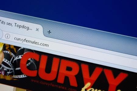Ryazan, Russia - September 09, 2018: Homepage of Curvy Females website on the display of PC, url - CurvyFemales.com.のeditorial素材