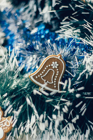 Christmas decoration with bell on christmas treeの写真素材