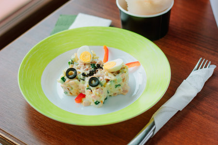 Kid food - potato salad with eggs in a form of butterfly, great image for your needs.の写真素材