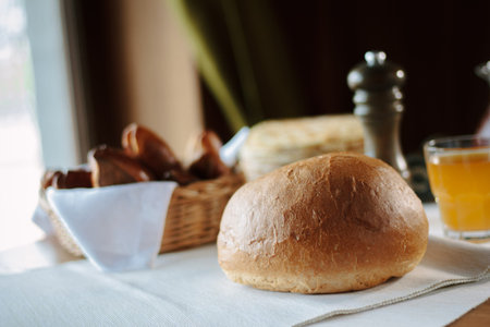 Fresh round bread at the restaurant table.