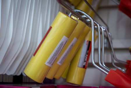Ryazan, Russia - October 01, 2019: Rollers for wallpaper mounting in a shop.のeditorial素材