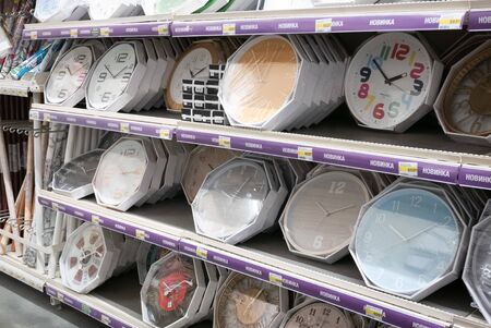Ryazan, Russia - October 01, 2019: A lot of different wall clocks in a market.のeditorial素材