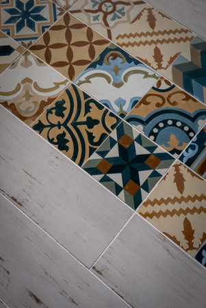 Vintage ceramic tiles mosaic on the wall.