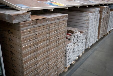 Ryazan, Russia - October 01, 2019: Packages with the laminate flooring in a construction mall.のeditorial素材