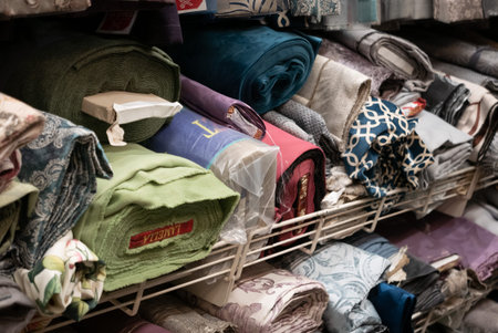 Rolls of fabric material in a textile shop