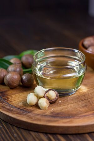 Macadamia nuts neat the can with macadamia oil. Great photo for your needs.の写真素材