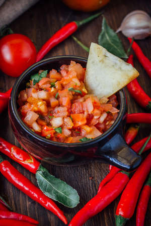 Red hot chili peppers with the raw salsa dip - hot and tasty.の写真素材