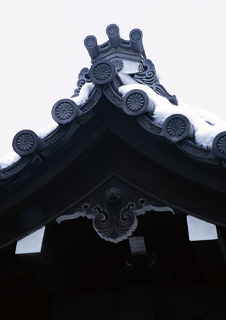 old Japanese shrine or pagoda entrance with wooden roof decorations background