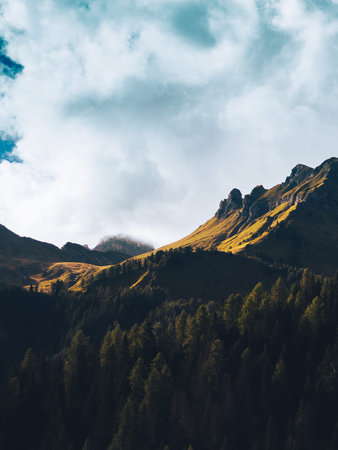 Mountain landscape with forest and cloudy sky. Caucasus Mountains, Georgia.