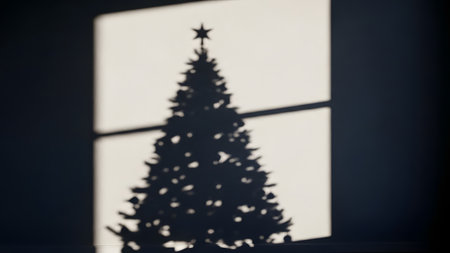 Silhouette of a Christmas tree on a background of the windowの素材