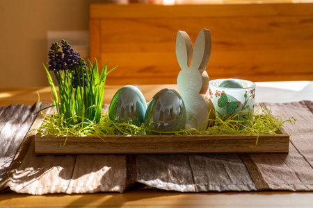 Easter decoration with egg and bunny on a table