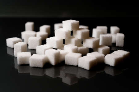 Sugar cubes in different arrangements and colored light. Bavaria Germany, Arrow, Cubes, Pile, Square,の写真素材