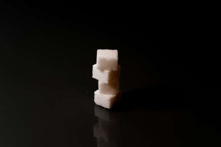 Sugar cubes in different arrangements and colored light. Bavaria Germany, Arrow, Cubes, Pile, Square,の写真素材