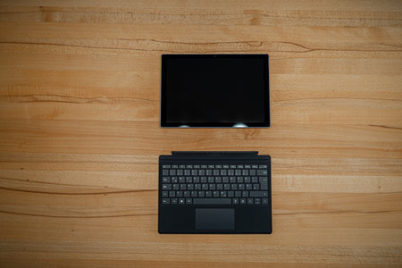Tablet PC for home office on a wooden desk in Bavaria