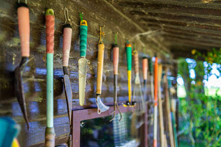 Garden Shed with Gardening Tools at Flower Potts in a Garden in Lower Bavaria Germanyの写真素材