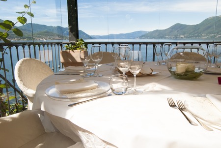 A set table in a restaurantの写真素材