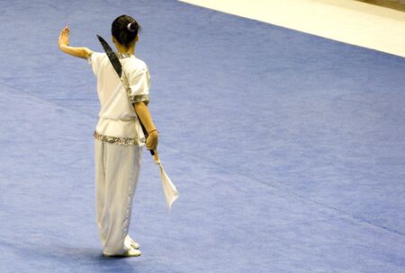 Chinese martial arts exponent in a Wushu competition.の写真素材