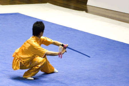 Chinese martial arts exponent in a Wushu competition.の写真素材