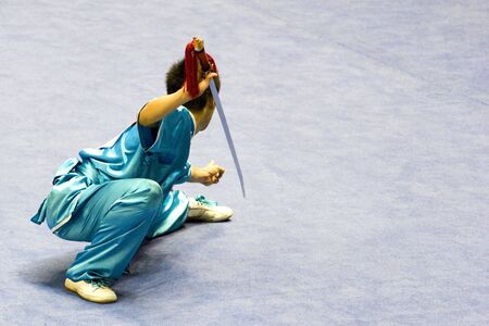 Chinese martial arts exponent in a Wushu competition.の写真素材