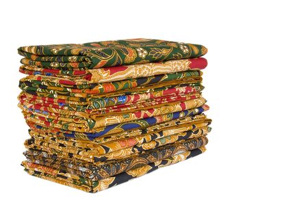 Isolated image of a stack of Batik Sarongs.の写真素材
