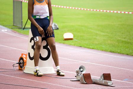 Image of a 400 meters athlete at the starting block.の写真素材