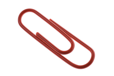 Isolated macro image of a red paper clip.の写真素材