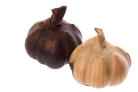 Isolated macro image of smoked garlic.の写真素材