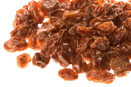 Isolated macro image of dried raisins.の写真素材