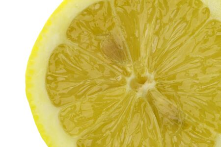 Isolated macro image of a sliced lemon.の写真素材