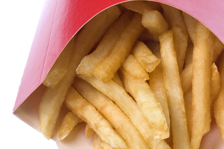Isolated macro image of french fries.