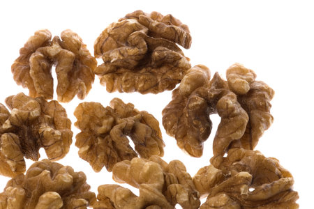 Isolated macro image of walnuts.