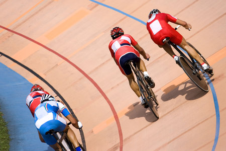 Image of participants in a cycling points race held at a velodrome.の写真素材