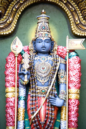 Image of a Hindu diety sculptured out of stone.