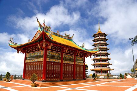 Image of a Chinese temple and a pagoda in Malaysia.の写真素材
