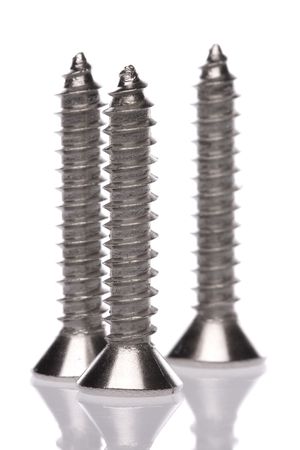 Isolated macro image of metal screws.の写真素材