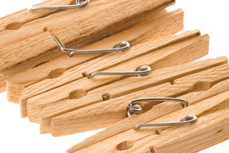 Isolated macro image of wooden laundry pegs.の写真素材